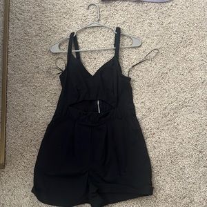 Black denim cut out romper from urban outfitters